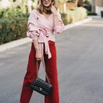 red striped wrap top and red crop jeans