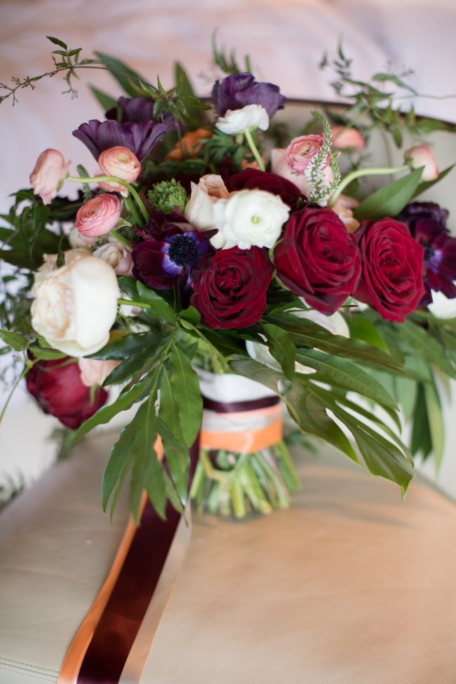 tropical-wedding-flowers-red-roses-ivory-blush