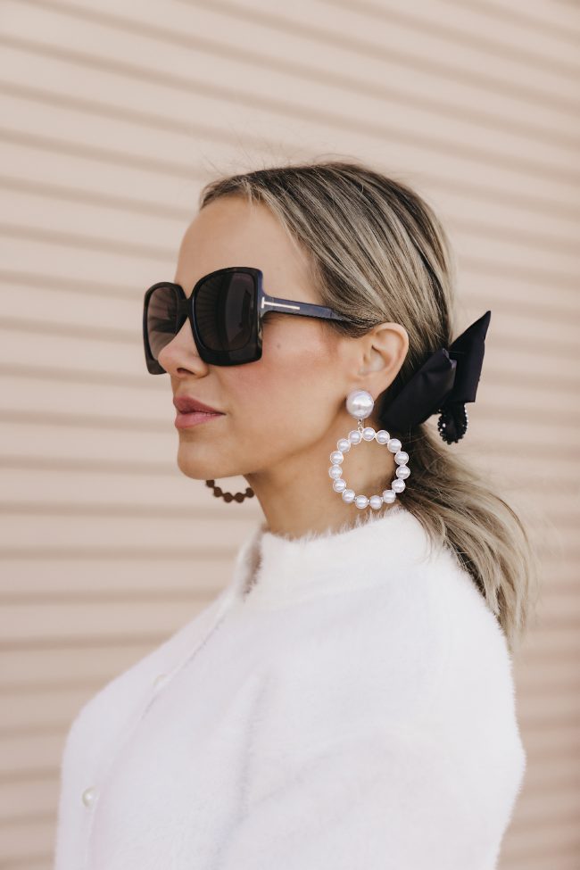 large-round-pearl-earrings-pony-tail-with-black-zara-bow