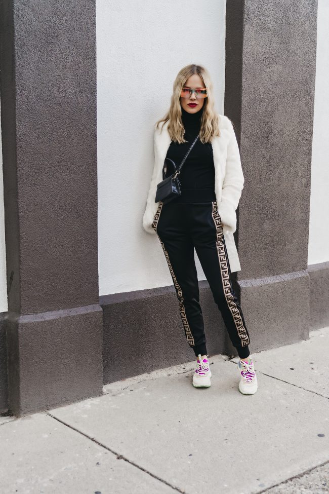 SLC fashion blogger wearing Angela roi handbag and fendi joggers