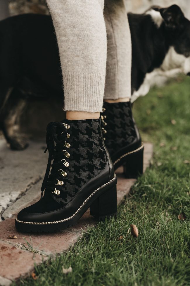 Fashion blogger Angie Harrington wearing booties with a heel for a chic fall and winter look