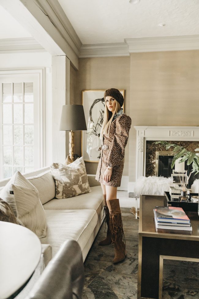 Fashion blogger wearing a fall inspired outfit and leather western boots with fringe